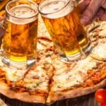 People Crafting Beer with Italian Pizza
